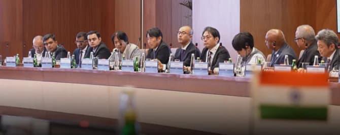 Delegates participating in a conference panel